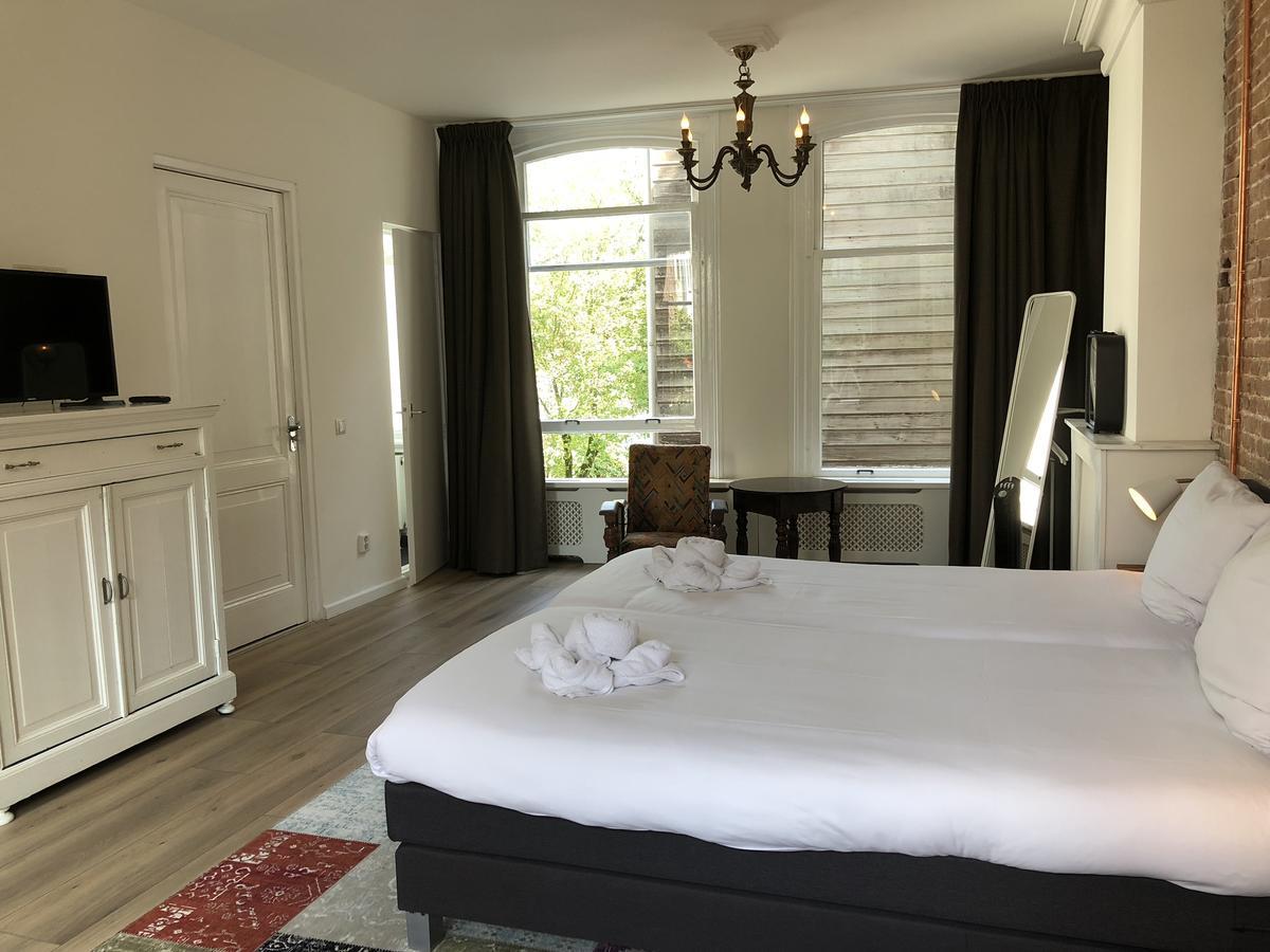 Nine-T-Teen Bed And Boutique Amsterdam Bagian luar foto